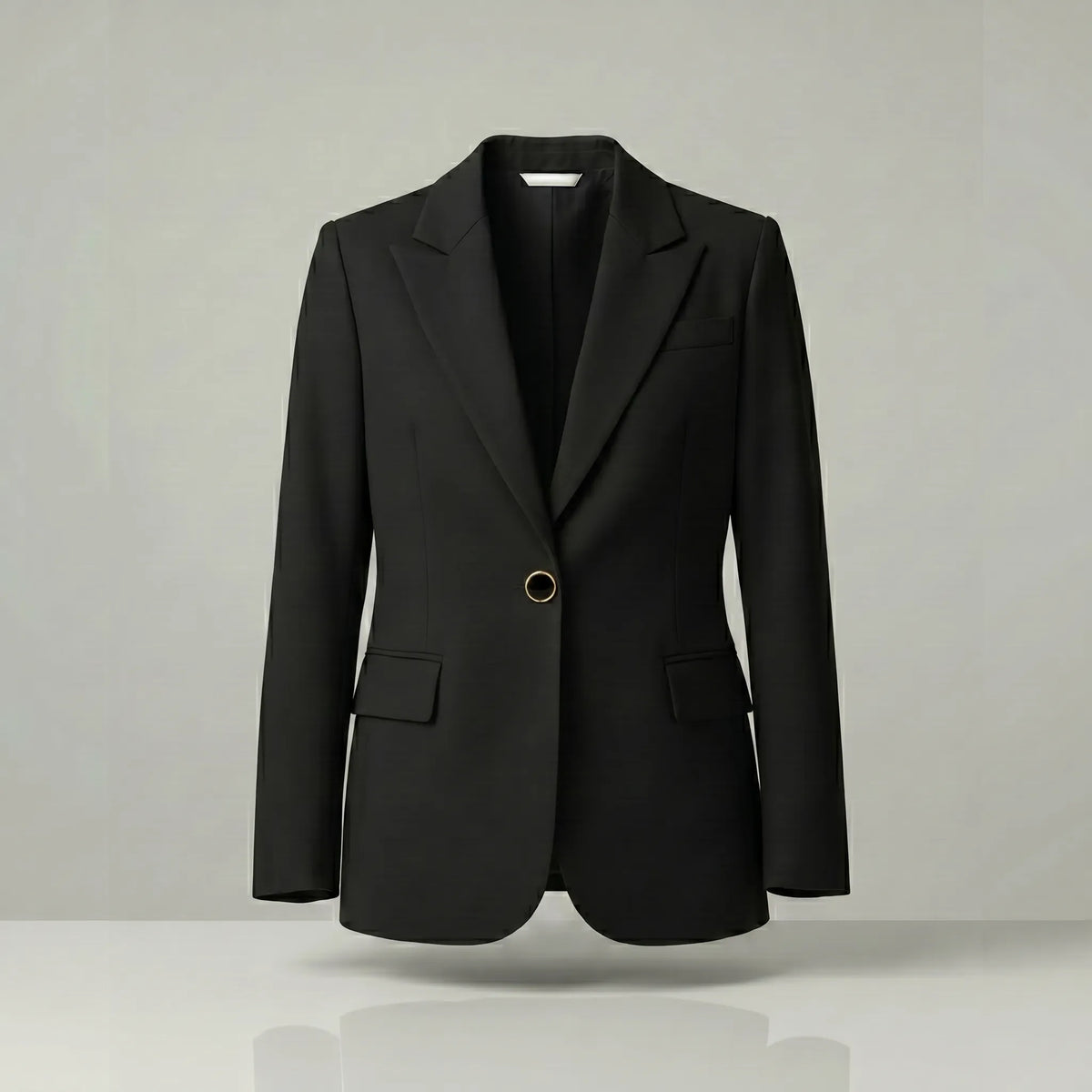 Black blazer on a light gray background