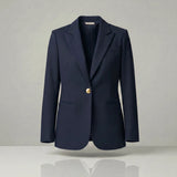 Navy blazer with a gold button on a light gray background