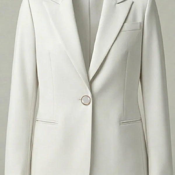 White blazer on a light gray background