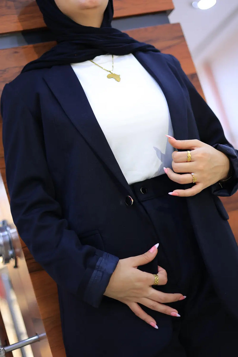 “ZAYTA navy women’s blazer on model over white top, blurred background”
