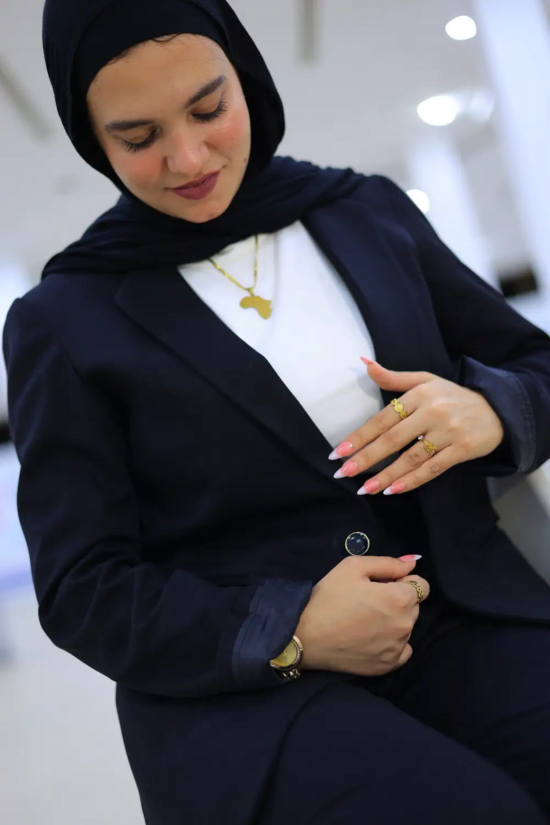 “ZAYTA navy women’s blazer on model with white shirt and gold jewelry”
