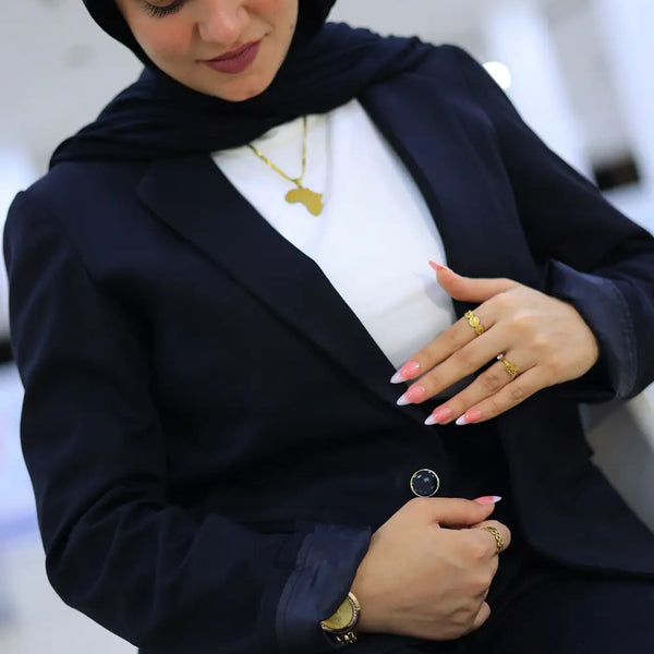 “ZAYTA navy women’s blazer on model with white shirt and gold jewelry”
